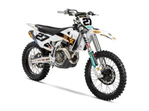 Husqvarna Motocross-Motorrad mit auffälligem Design und Nummer 27, ideal für Offroad-Abenteuer und Rennen.